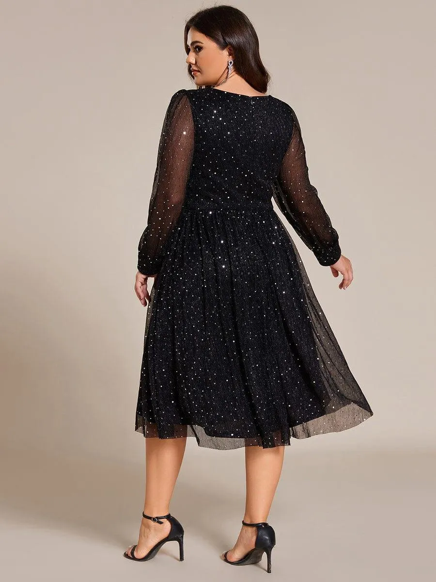 Robe de mariée mi-longue pailletée à manches longues
