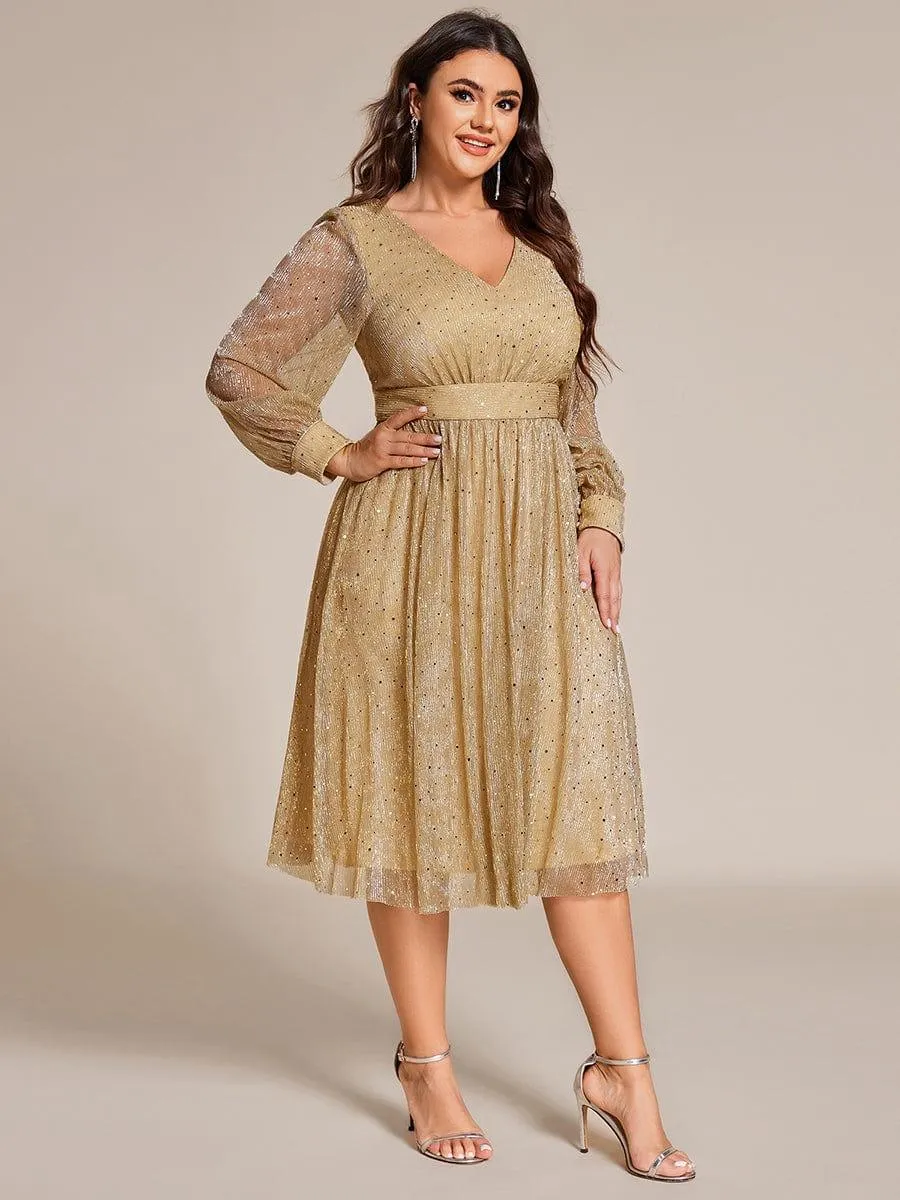 Robe de mariée mi-longue pailletée à manches longues