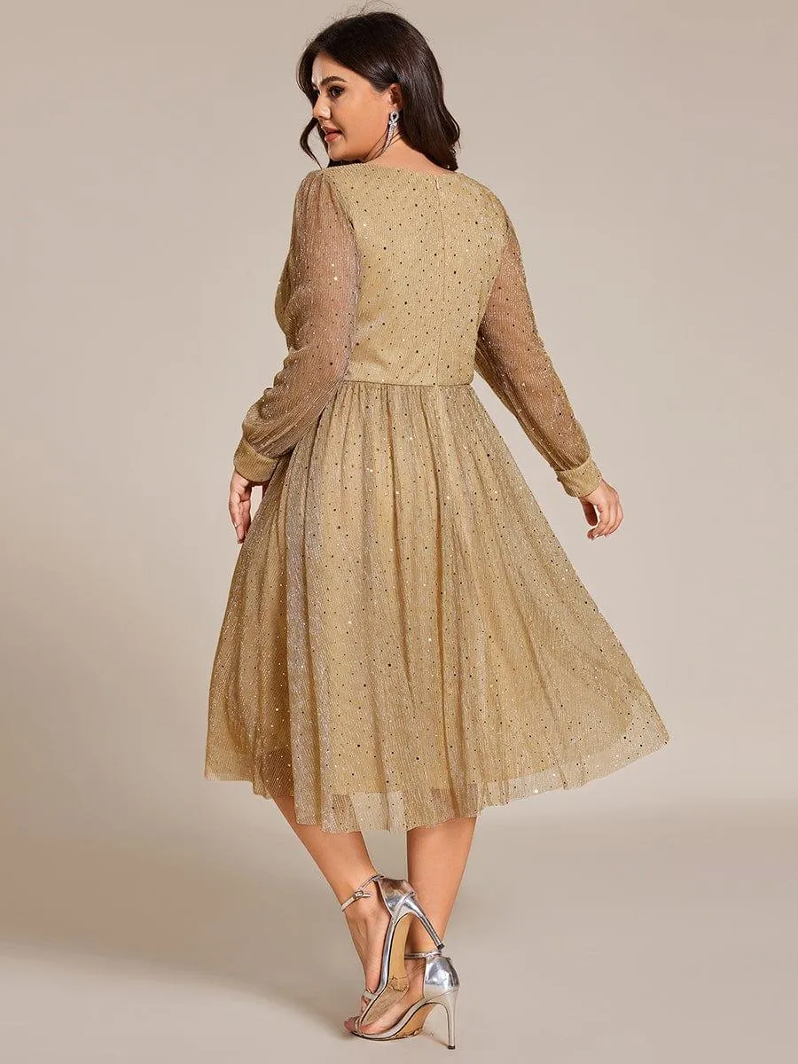 Robe de mariée mi-longue pailletée à manches longues