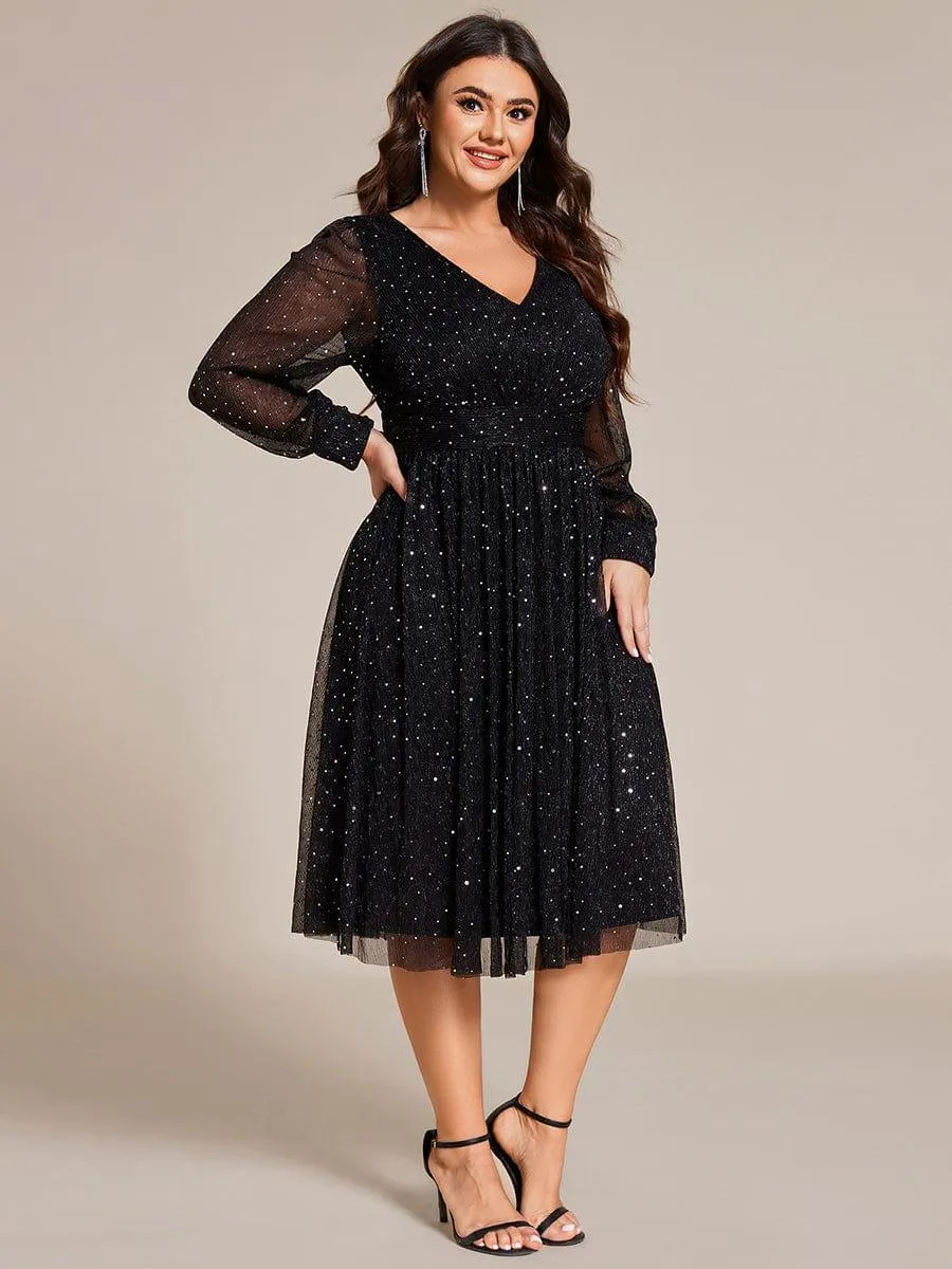 Robe de mariée mi-longue pailletée à manches longues