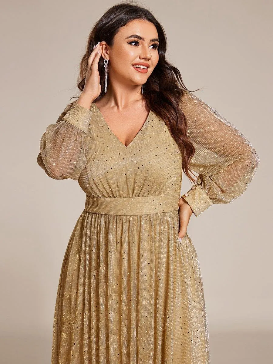 Robe de mariée mi-longue pailletée à manches longues