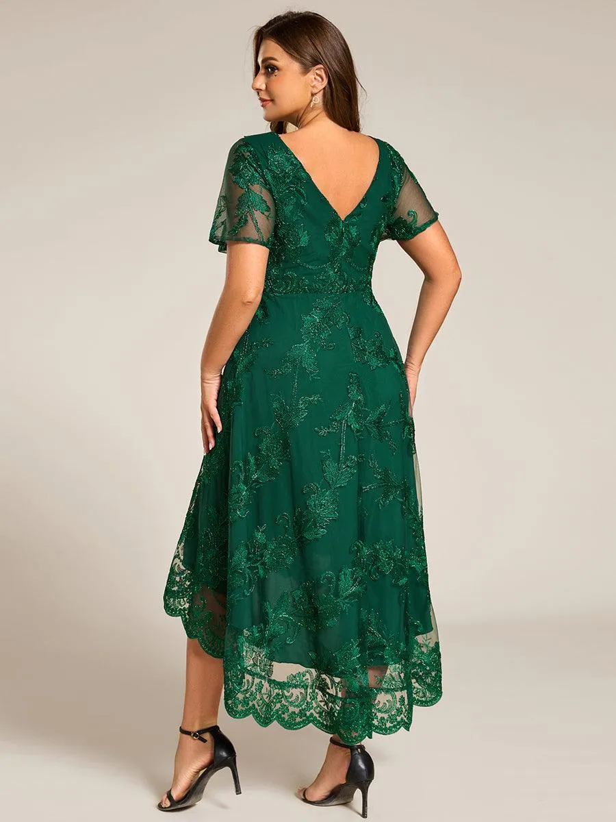 Robe d'invitée de mariage mi-longue à col en V et en maille brodée grande taille