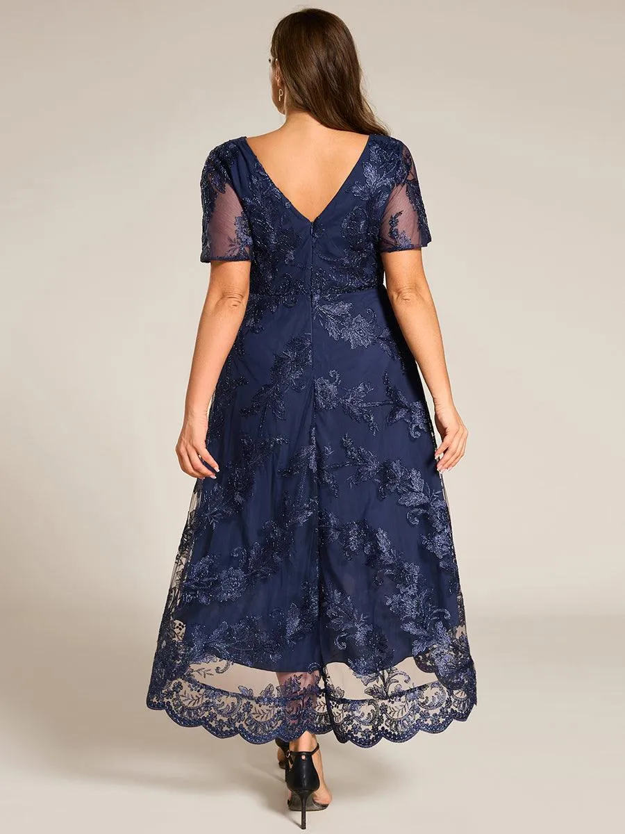 Robe d'invitée de mariage mi-longue à col en V et en maille brodée grande taille