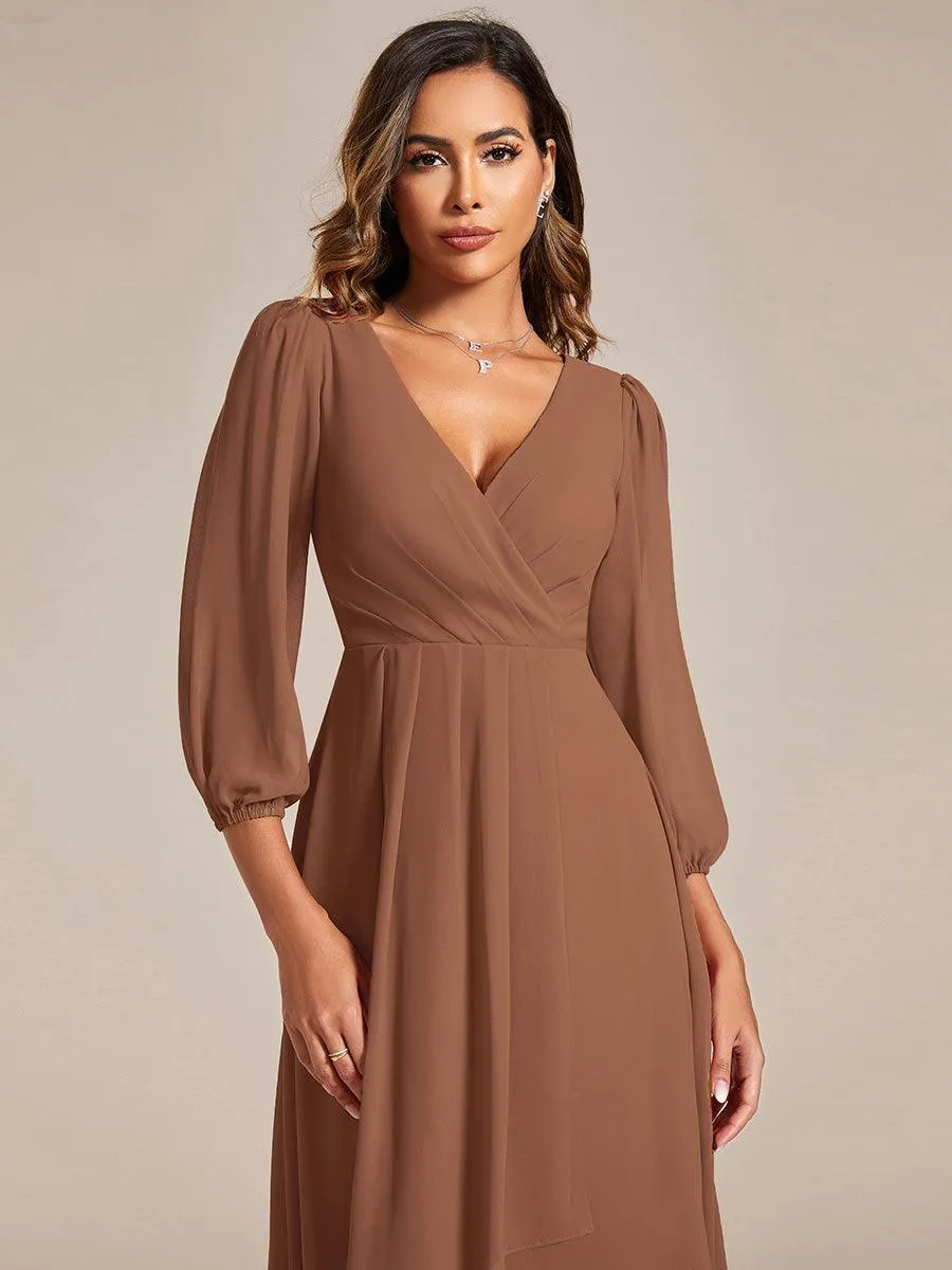 Robe invité de mariage mi-longue manches longues ourlet asymétrique