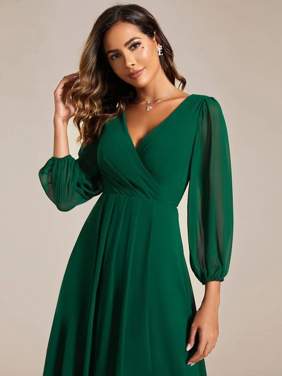 Robe invité de mariage mi-longue manches longues ourlet asymétrique
