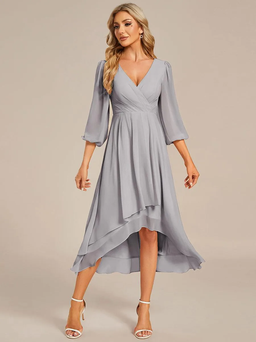 Robe invité de mariage mi-longue manches longues ourlet asymétrique