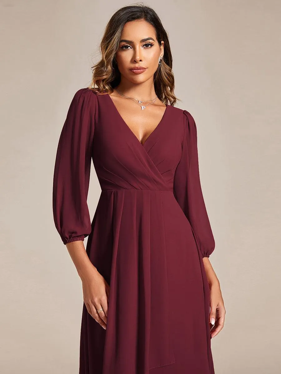 Robe invité de mariage mi-longue manches longues ourlet asymétrique
