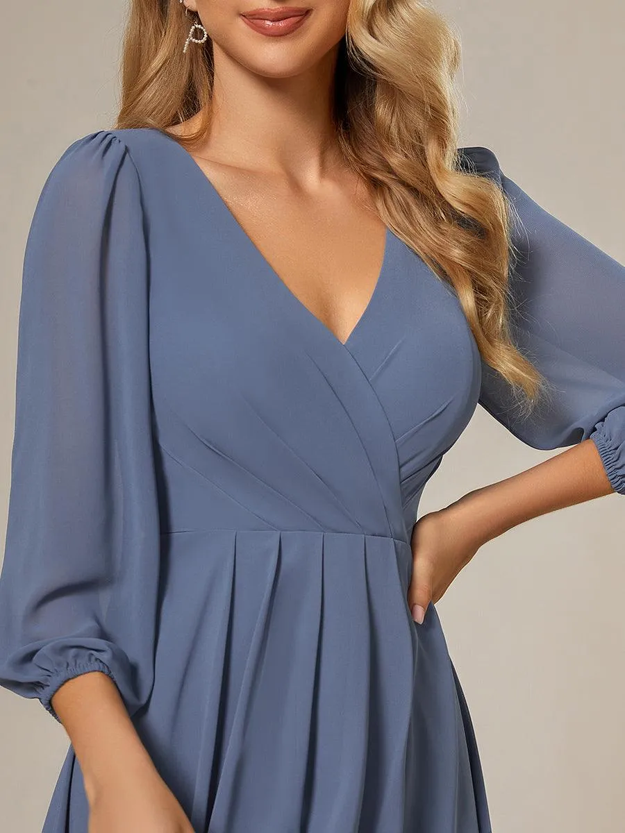 Robe invité de mariage mi-longue manches longues ourlet asymétrique