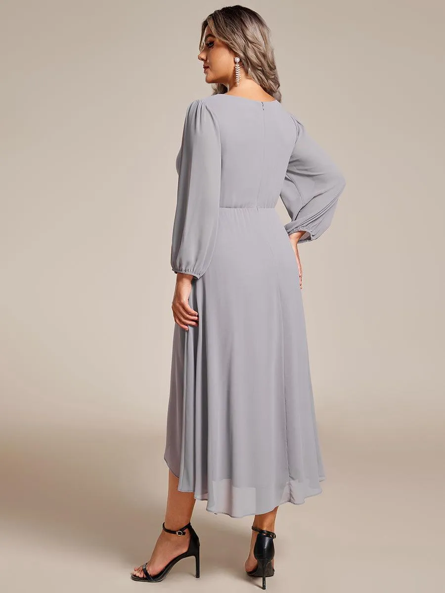 Robe invité de mariage mi-longue manches longues ourlet asymétrique
