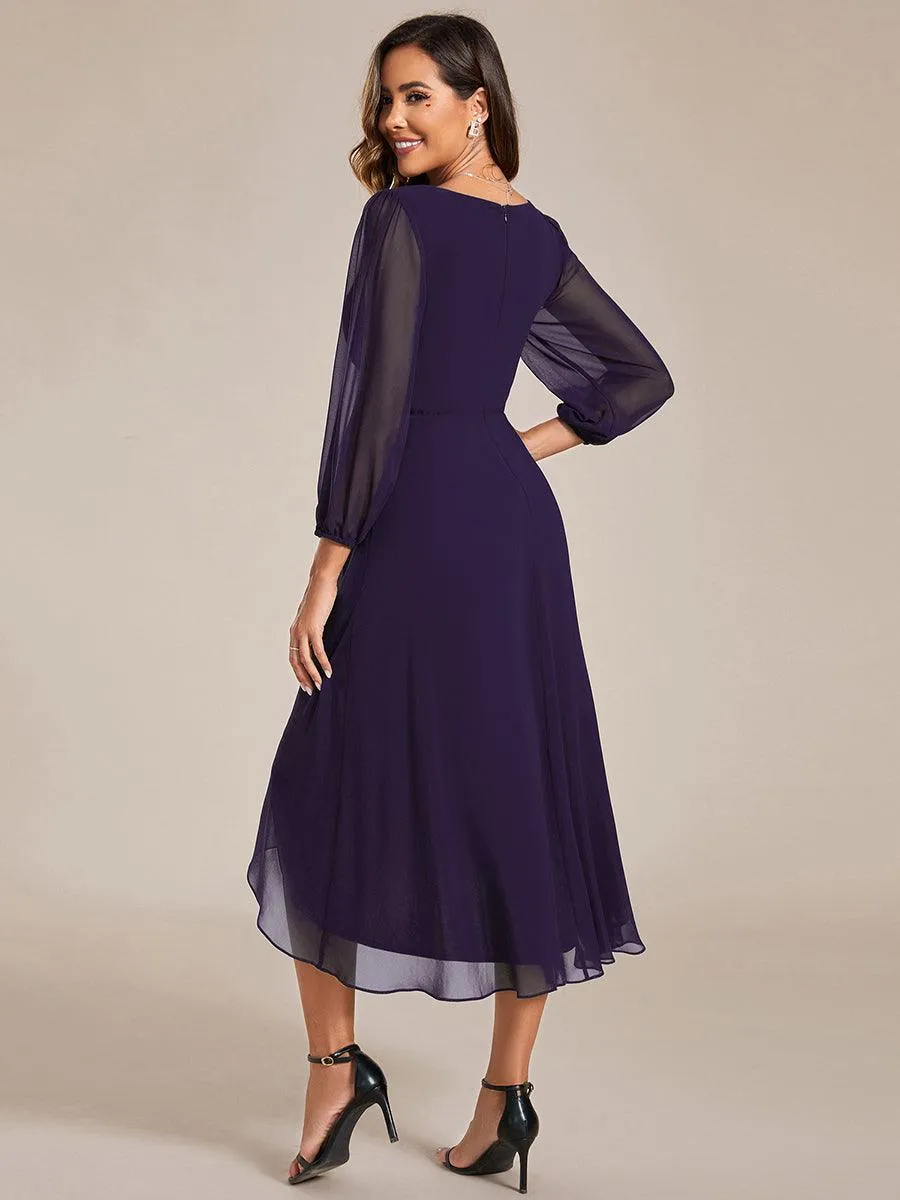 Robe invité de mariage mi-longue manches longues ourlet asymétrique