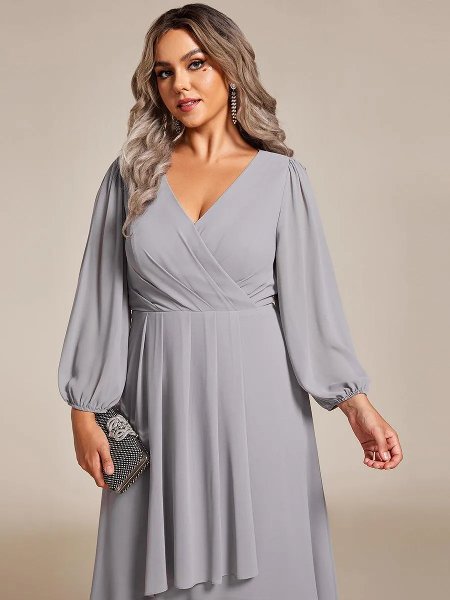 Robe invité de mariage mi-longue manches longues ourlet asymétrique