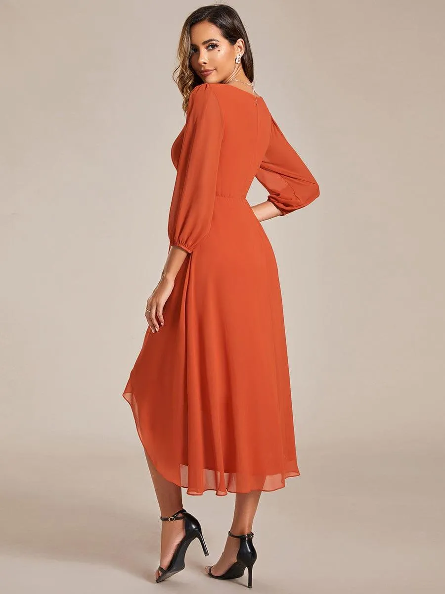 Robe invité de mariage mi-longue manches longues ourlet asymétrique