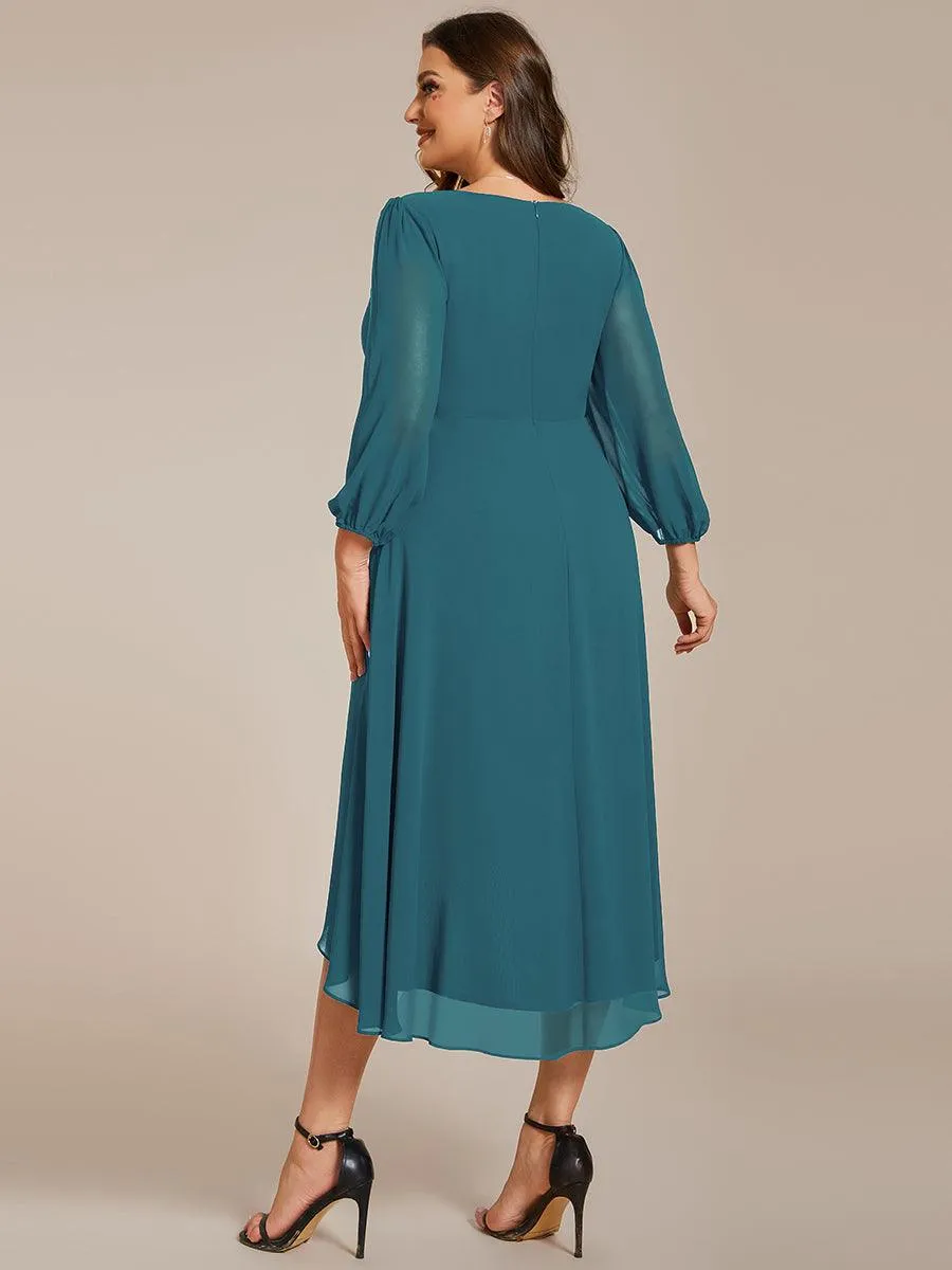 Robe invité de mariage mi-longue manches longues ourlet asymétrique