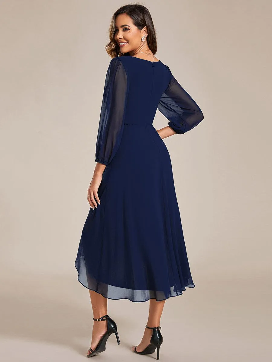 Robe invité de mariage mi-longue manches longues ourlet asymétrique