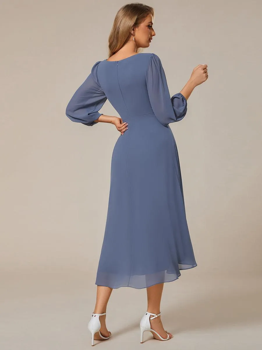 Robe invité de mariage mi-longue manches longues ourlet asymétrique