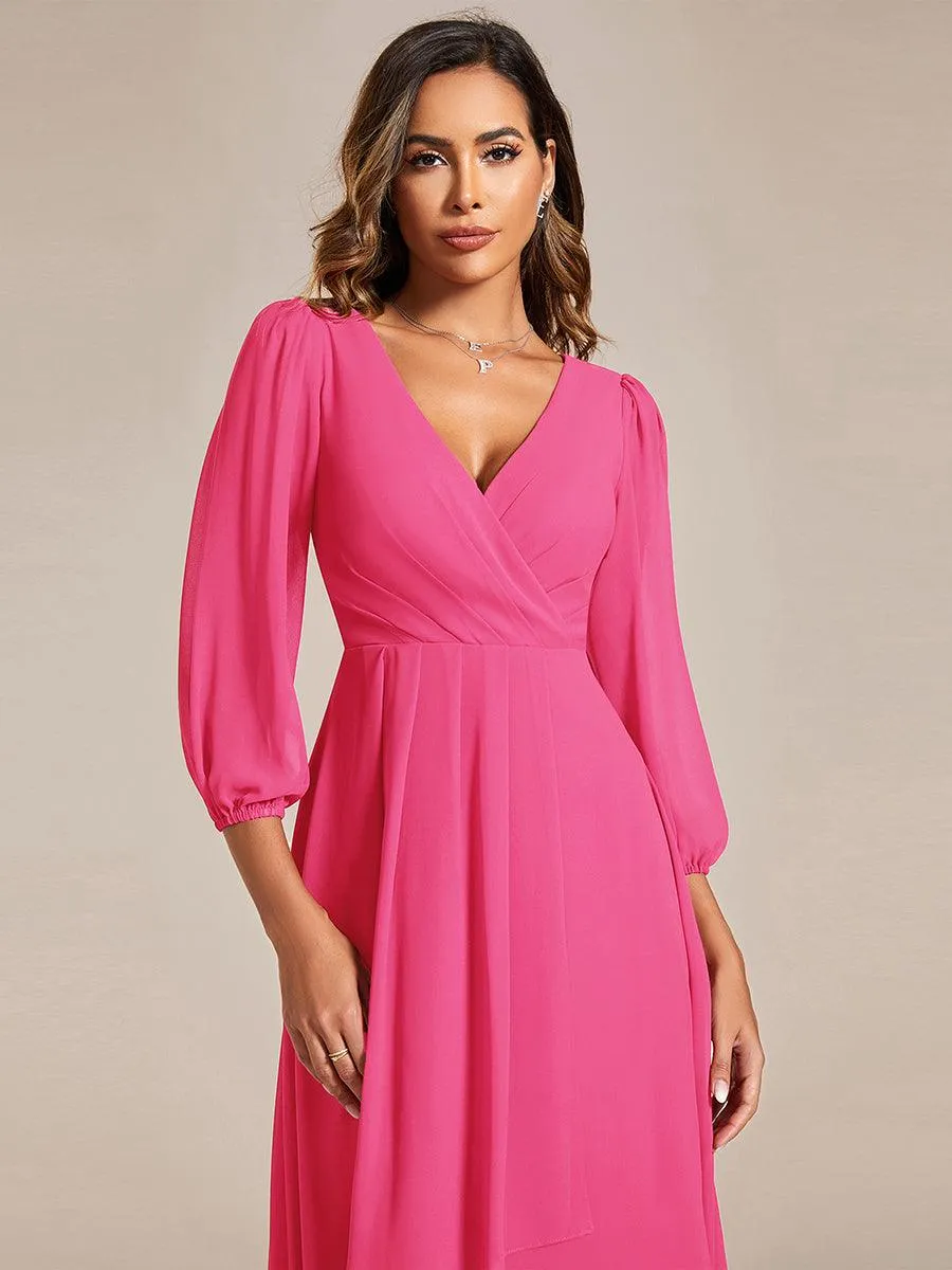Robe invité de mariage mi-longue manches longues ourlet asymétrique